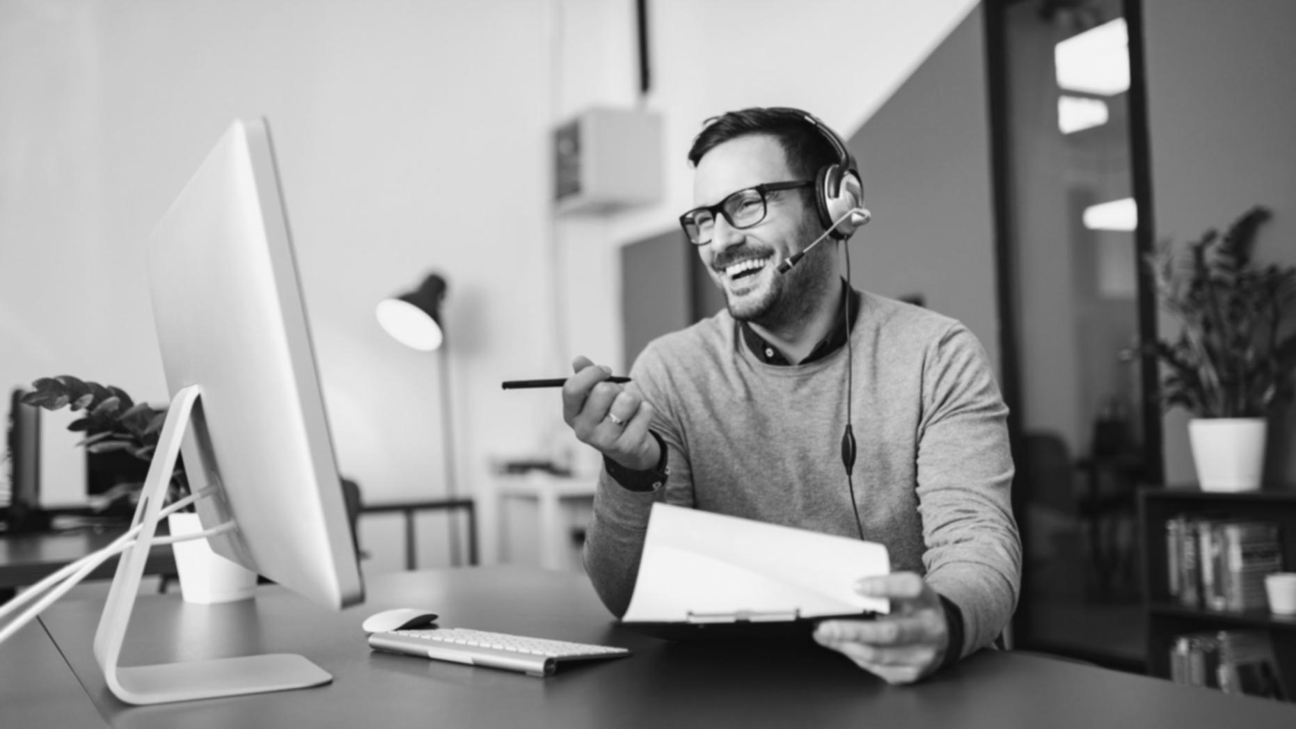 Workspace arrangement showing color calibration tools and interface design materials organized for collaborative review